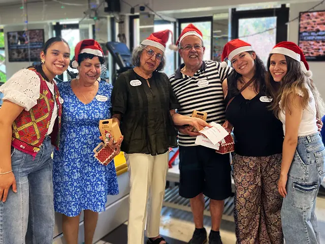 Comunidad de KinesicWork celebrando juntos en la fiesta de fin de año